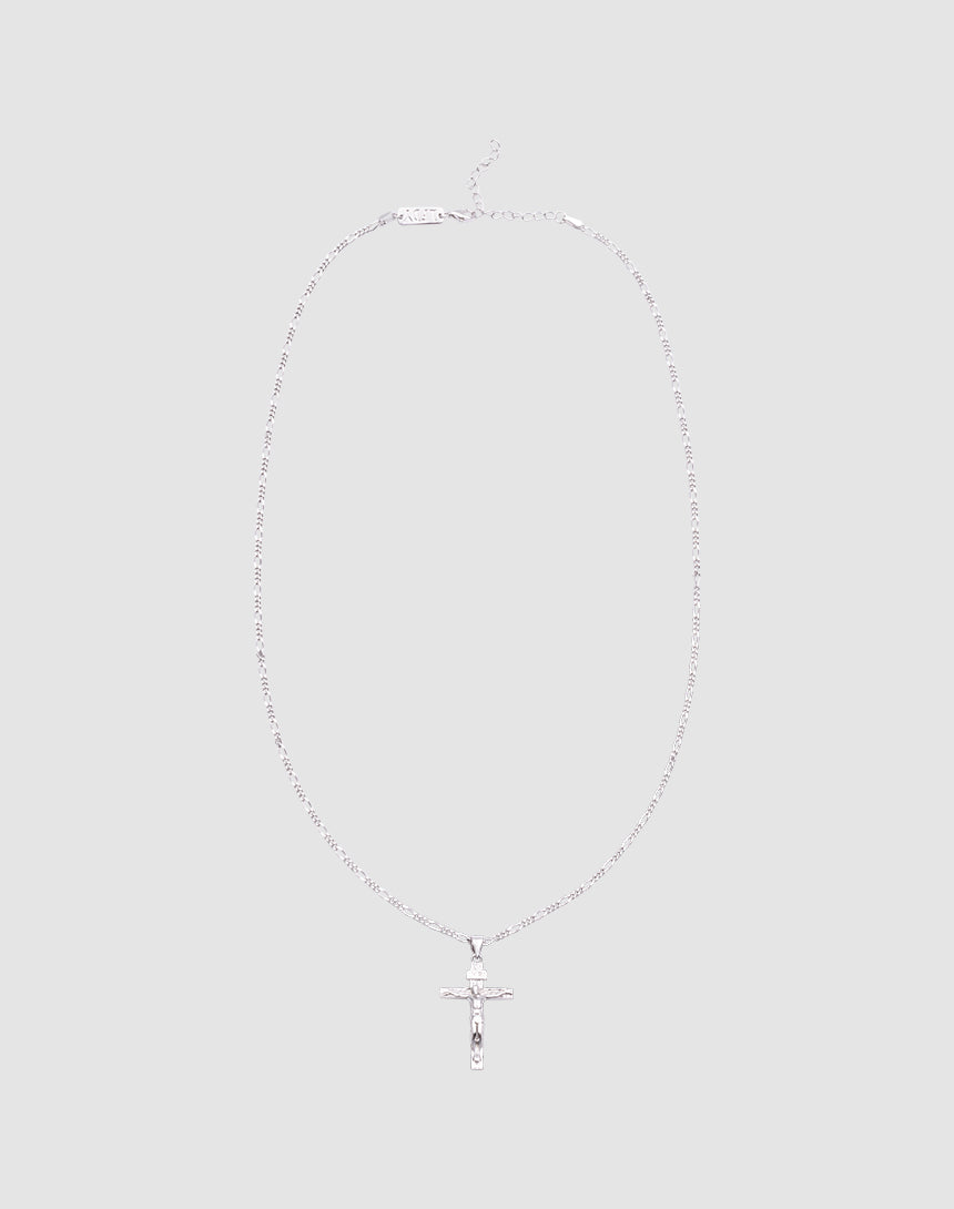The LIVE FAST DIE YOUNG Cross Pendant is a delicate silver necklace featuring a small cross crafted from 925 Sterling Silver, shown against a plain light gray background.