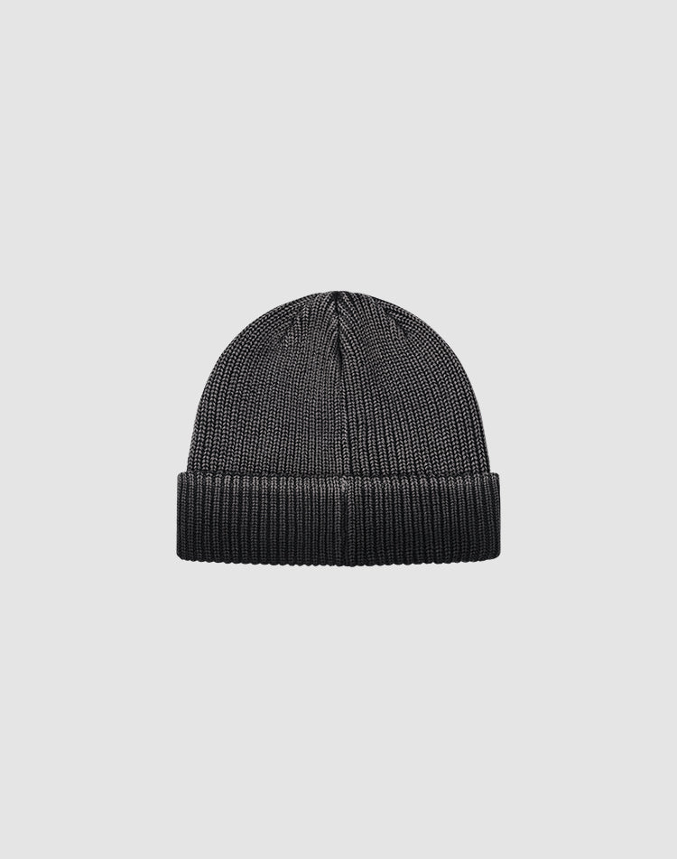 The LIVE FAST DIE YOUNG Double Rib Knit Beanie, in black 100% Baumwolle, features a folded cuff and doppellagig gestricktes Design for warmth and a voluminous look, shown on a plain light gray background.