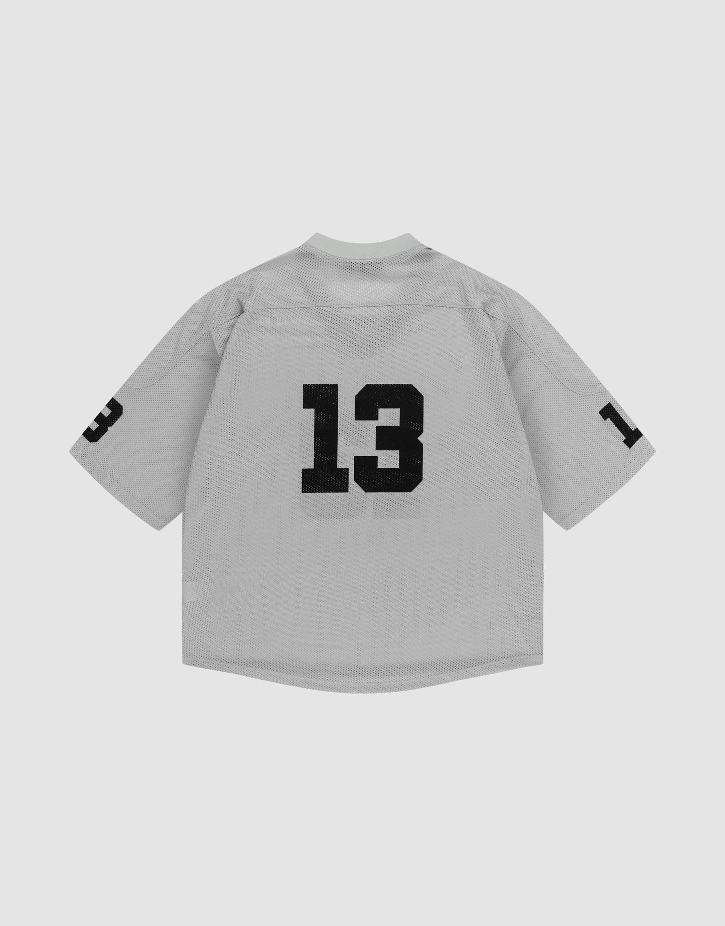 The LFDY Mesh Jersey by LIVE FAST DIE YOUNG is a light gray, short-sleeve polyester sports top with a V-neck and bold black number 13 printed on the back and both sleeves, shown against a plain white background.