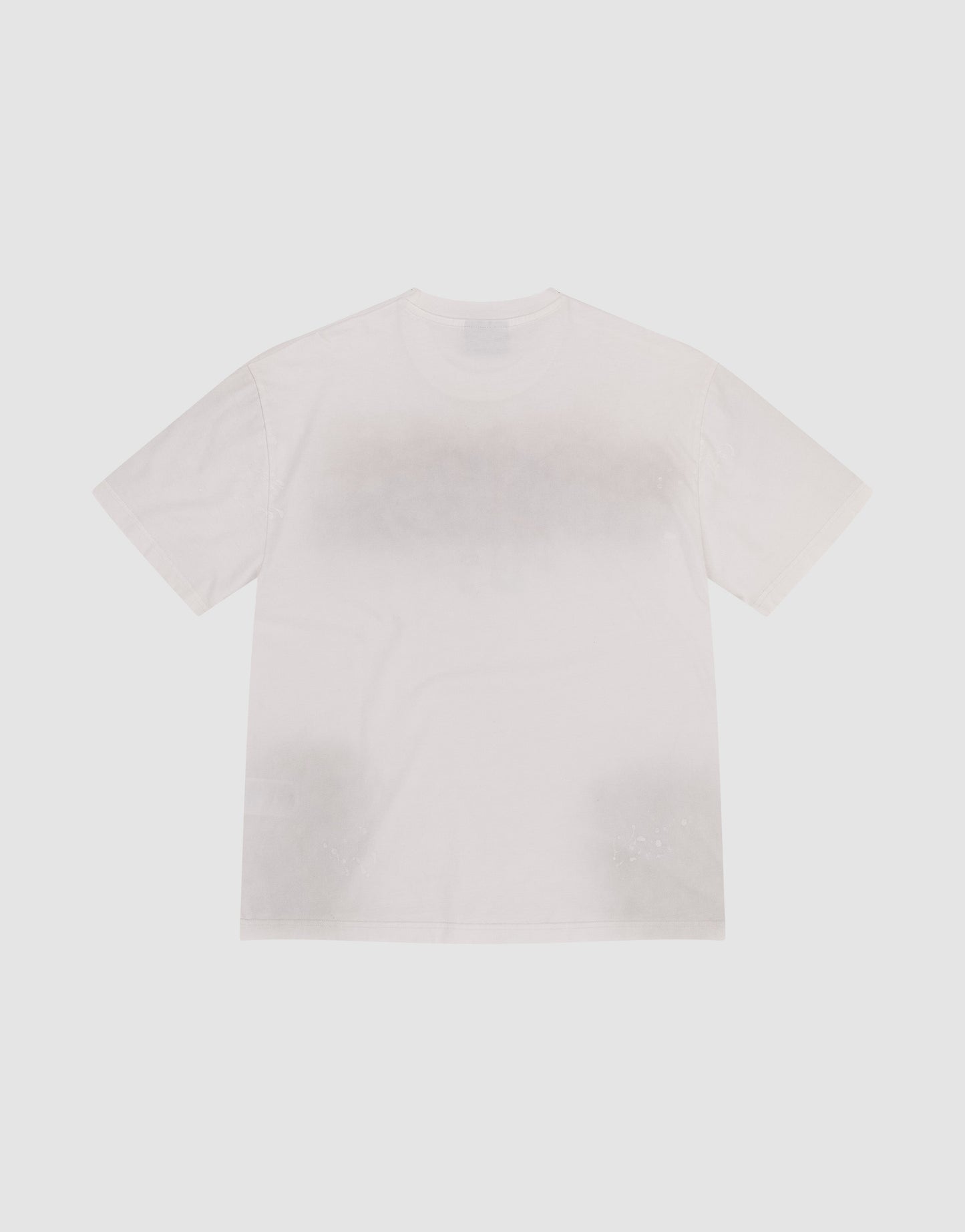 The LIVE FAST DIE YOUNG Live Fast Rivet Tee is a plain white, oversized short-sleeve t-shirt laid flat on a light background, highlighting its front side.