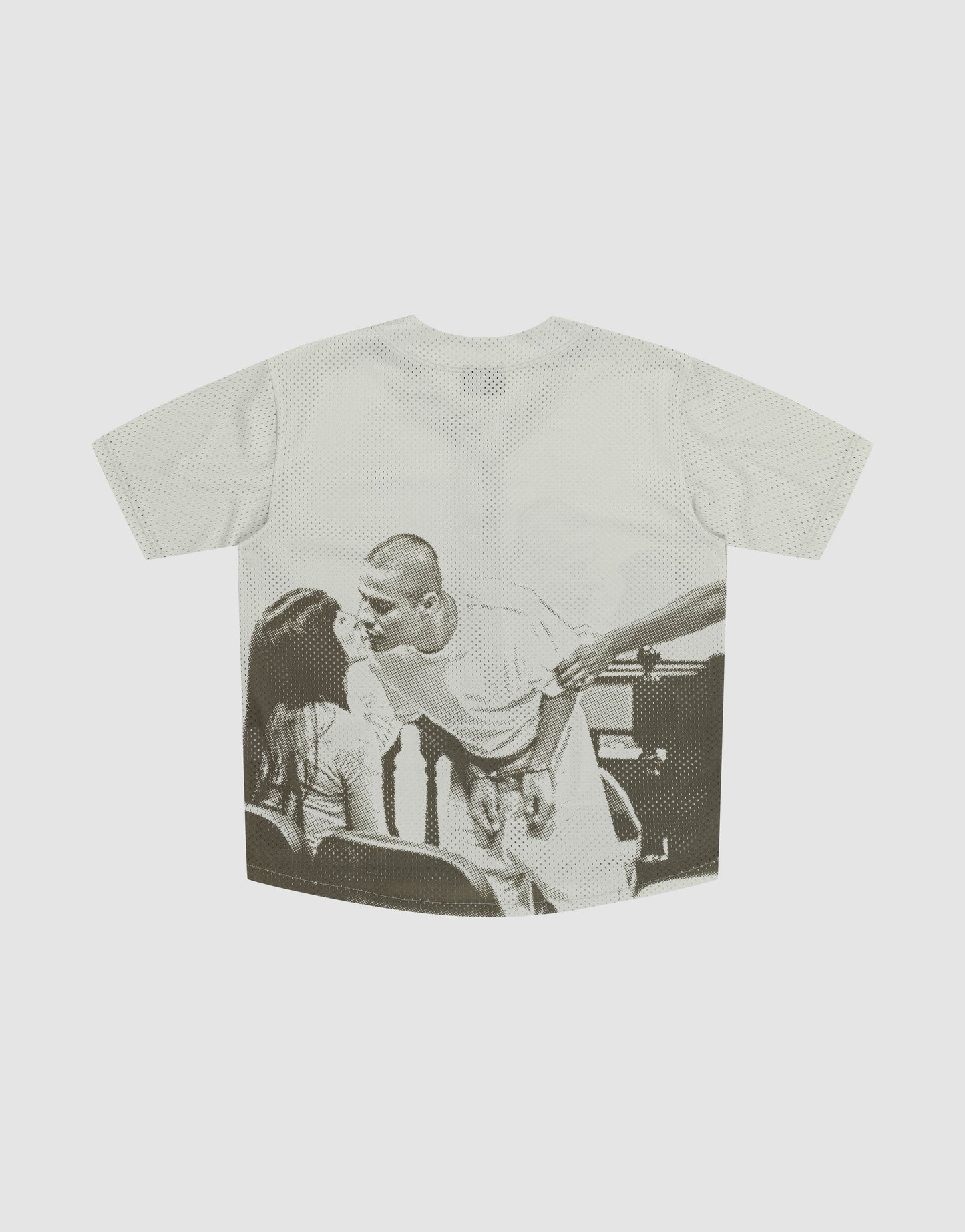 The LFDY Courtroom Jersey by LIVE FAST DIE YOUNG is an oversized T-shirt showcasing a black-and-white photo of a handcuffed man leaning to kiss a seated woman, with another person’s arm reaching toward him.