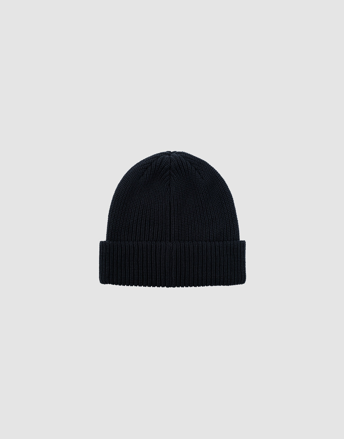 The Double Rib Knit Beanie by LIVE FAST DIE YOUNG is a black, 100% cotton hat with a folded brim, shown on a plain light gray background for a voluminous look.