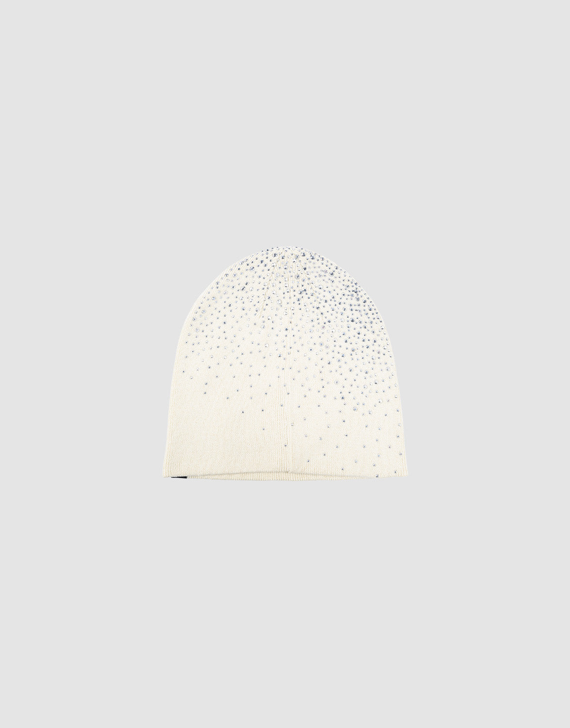 The LFDY Rhinestone Beanie by LIVE FAST DIE YOUNG is a white 100% Baumwolle knit hat, featuring scattered sparkling rhinestones and a subtle Flag-Label, shown on a plain light gray background.