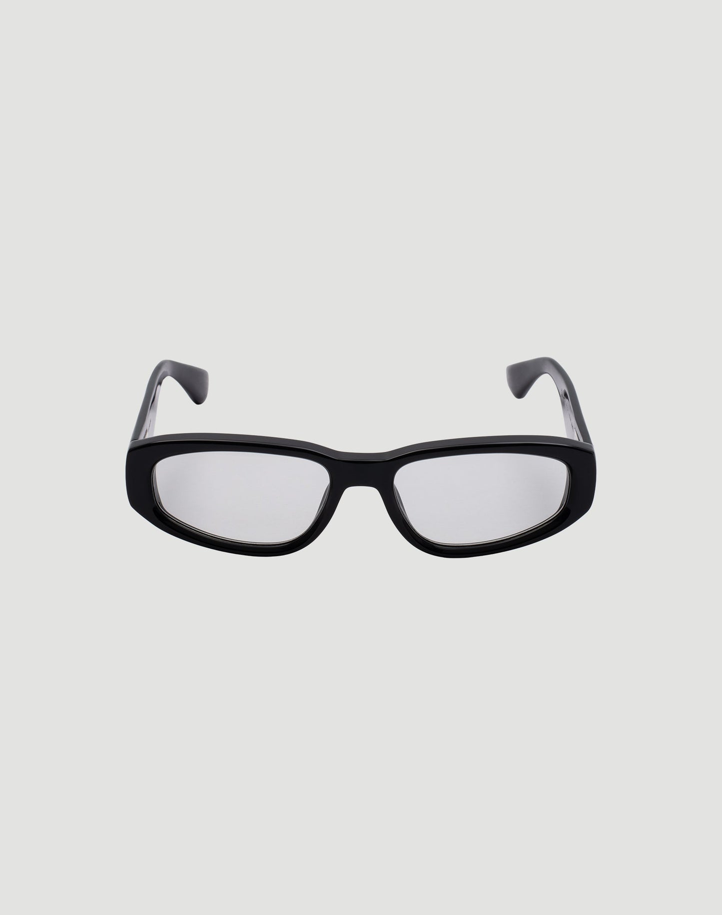 Front view of LIVE FAST DIE YOUNG LFDY x Chimi Shades 09, black rectangular frame with clear photochromic lenses offering UV protection, displayed on a plain light gray background.