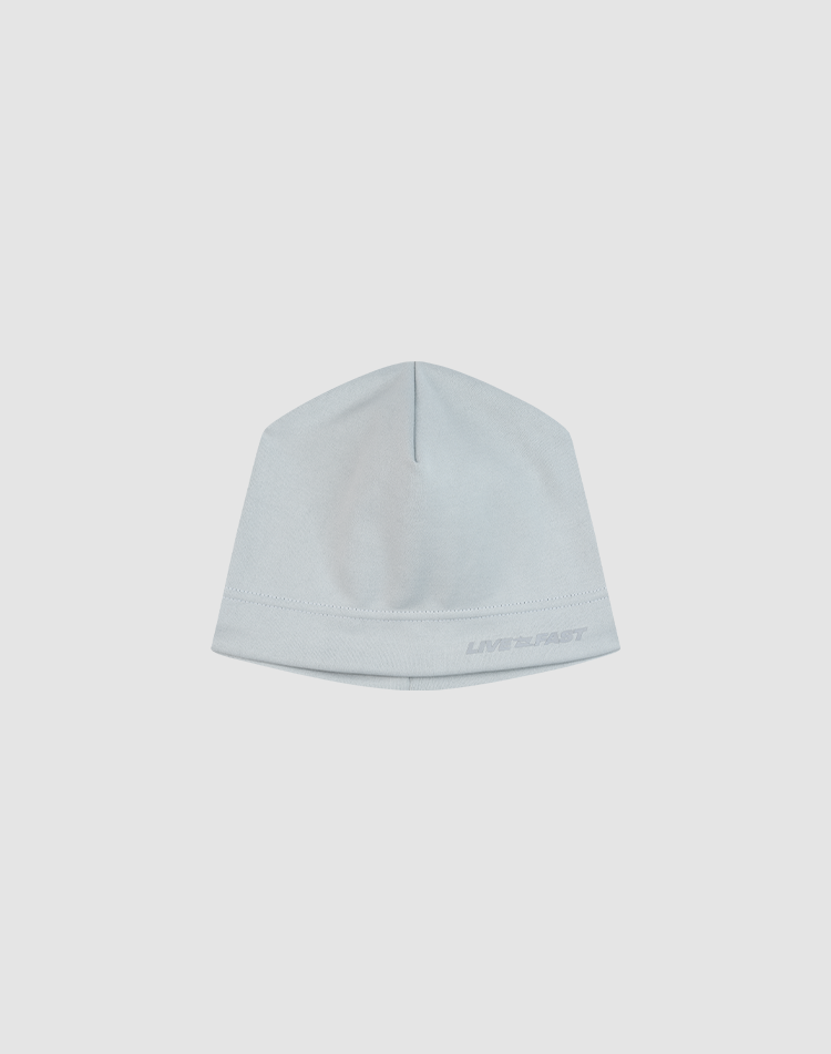 The Live Fast Performance Beanie by LIVE FAST DIE YOUNG, in light gray, is shown on a plain white background. It features a smooth, minimalist design with subtle stitching and a discreet logo near the bottom edge.