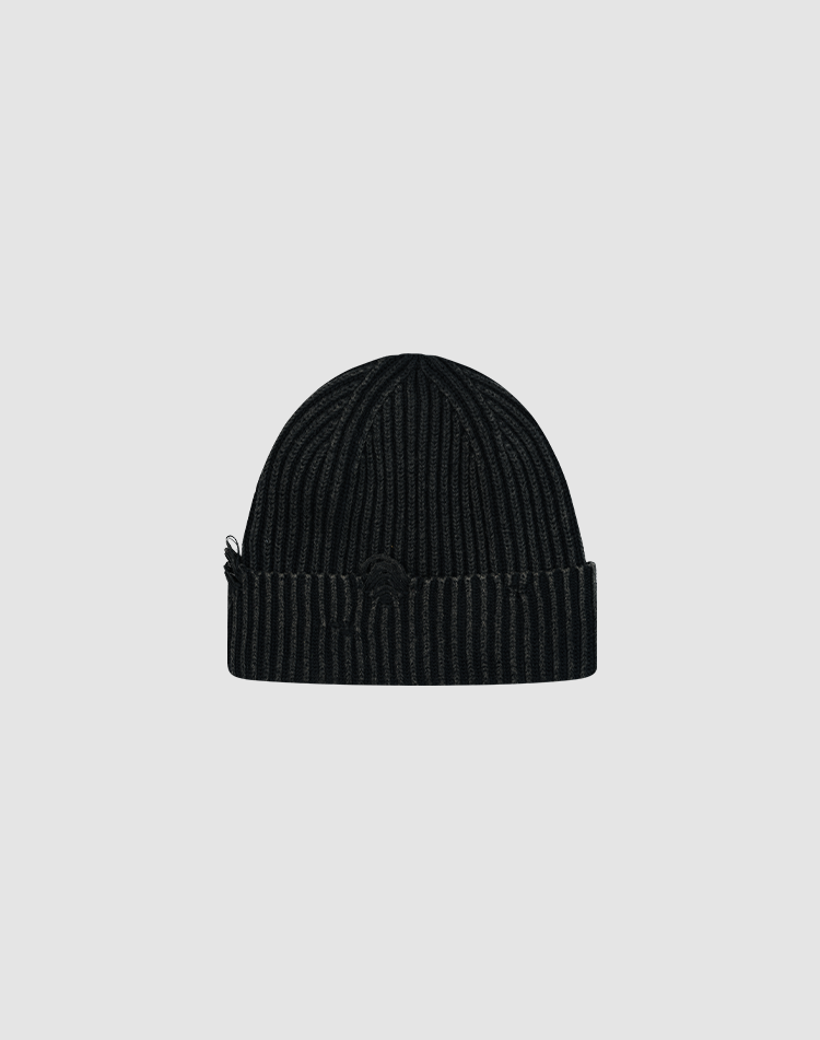 The LIVE FAST DIE YOUNG Distressed Rib Knit Beanie in black, made from 100% Baumwolle, features a folded brim and subtle Flag-Label, displayed centered on a plain light gray background.