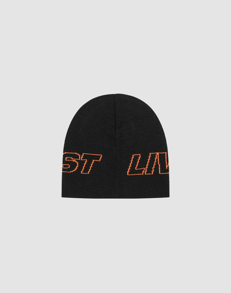The Live Fast Jacquard Beanie by LIVE FAST DIE YOUNG is a black Polyacryl beanie with orange outlined, partially visible Strick logo (ST left, LIV right), shown on a light gray background. Style code: LF2503-17393.