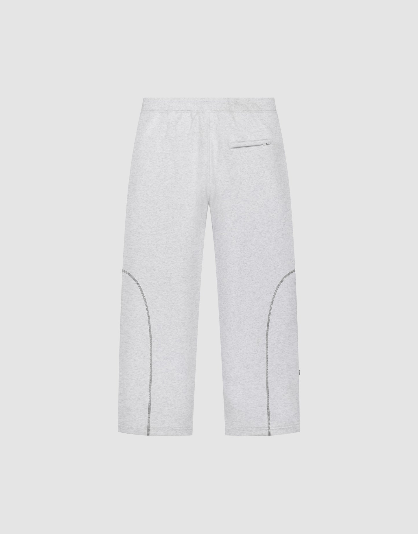 The LFDY Active Fleece Jogger by LIVE FAST DIE YOUNG features a wide fit, elastic waistband, zippered back pocket, curved lower leg seams, and a subtle logo print, shown against a plain white background.