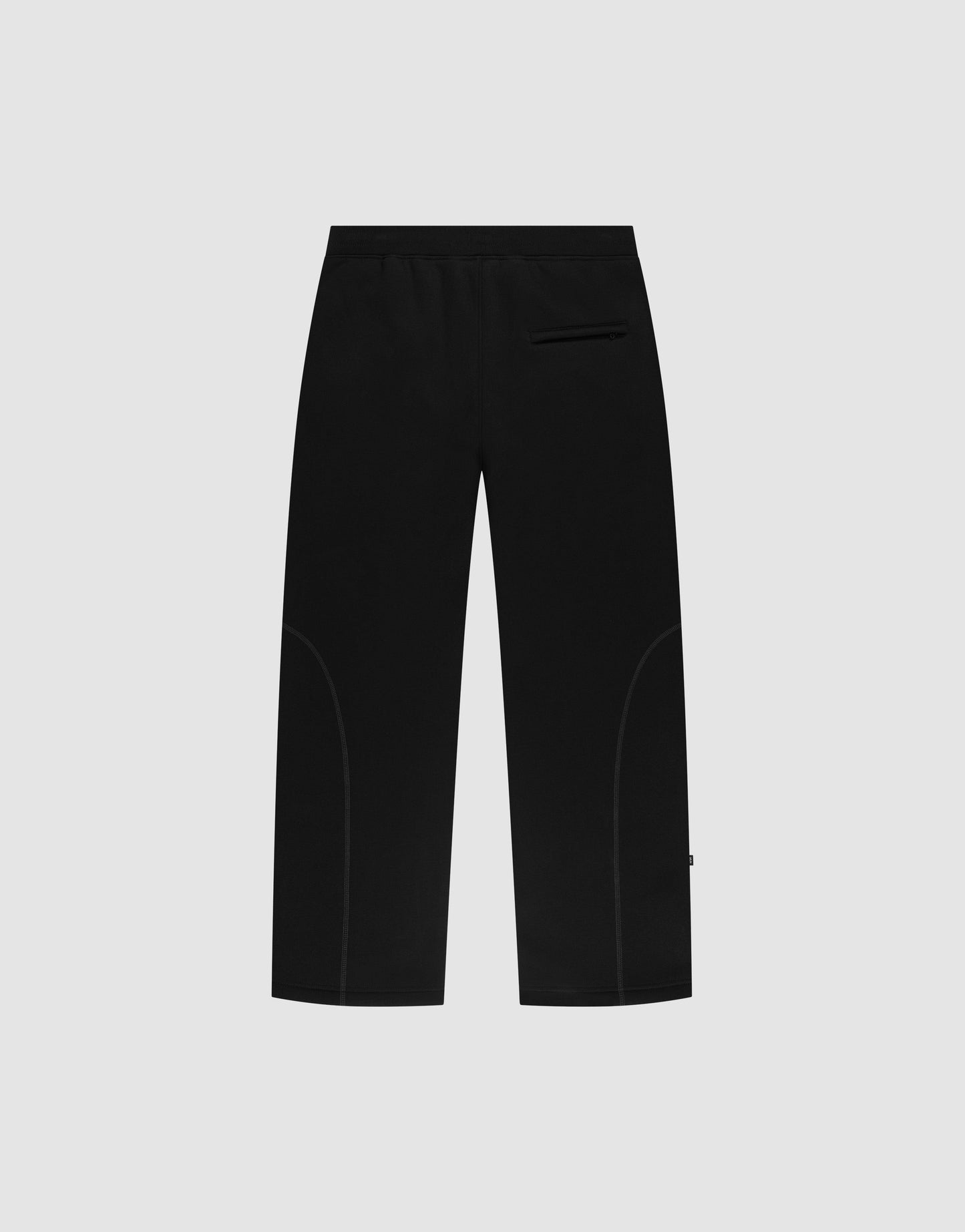 The LFDY Active Fleece Jogger by LIVE FAST DIE YOUNG features a black wide fit, straight legs, elastic waistband, right-side back pocket, and subtle seam detailing, shown against a light gray background.