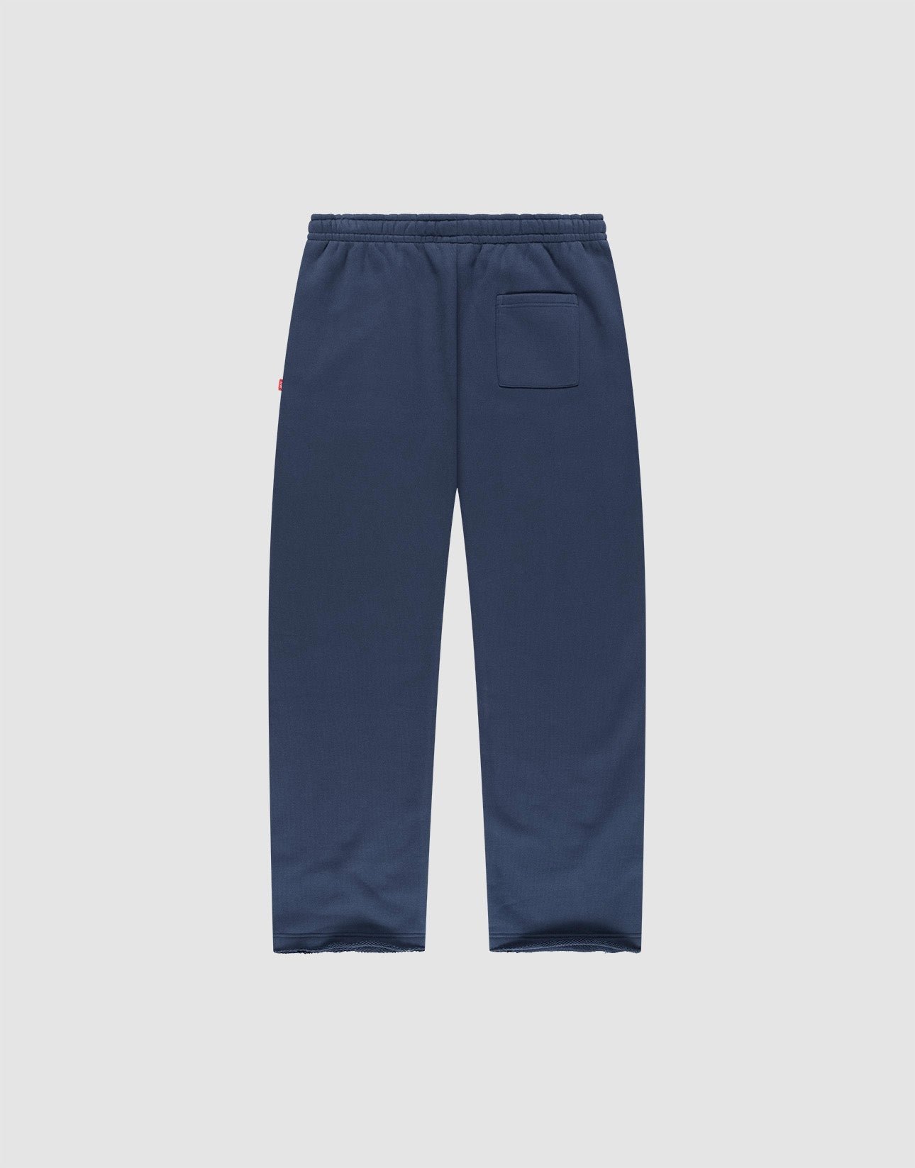 The LFDY Heavyweight Loungepants by LIVE FAST DIE YOUNG are navy blue wide fit joggers made from 100% cotton, with an elastic waistband and a single back pocket, shown flat on a plain light gray background.