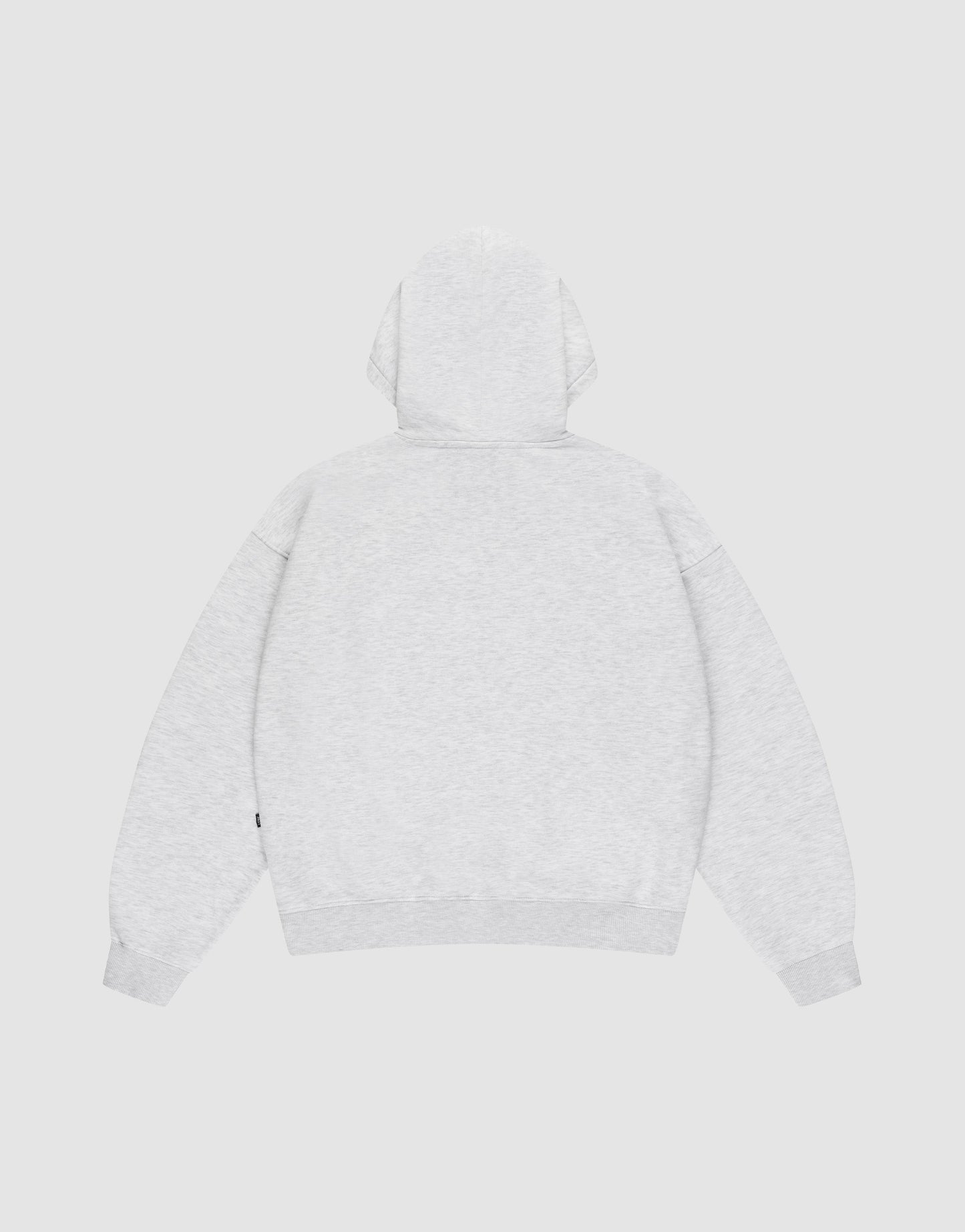 The LIVE FAST DIE YOUNG Basic Blank Hooded, shown laid flat, is an oversized light gray sweatshirt with long sleeves and a relaxed fit. Made from soft Baumwolle, it features no visible logos or designs on the back.
