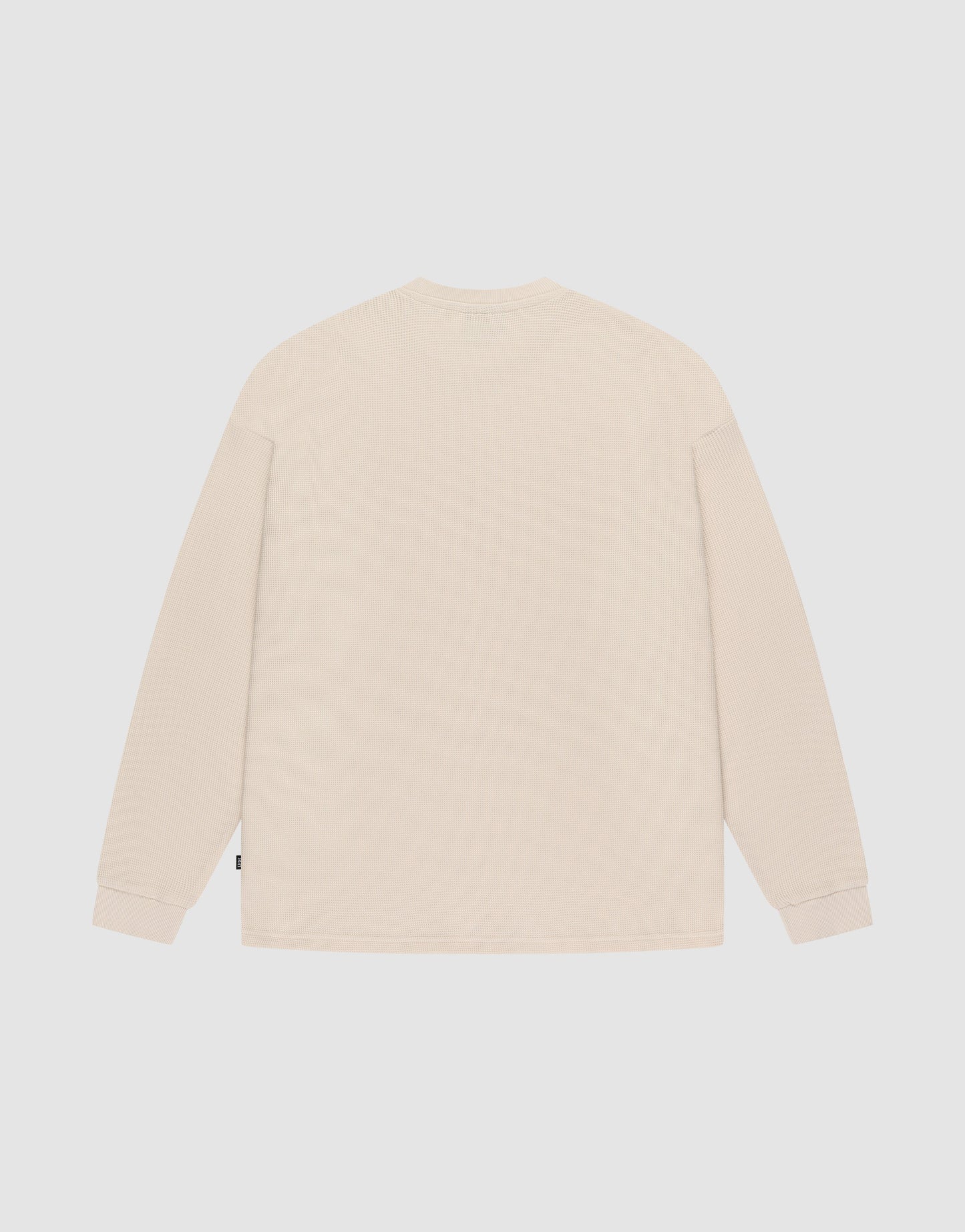 The Blank Waffle Longsleeve by LIVE FAST DIE YOUNG is shown flat on a white background, back view. Made from 100% Baumwolle with an oversize fit and subtle Ripp-Bündchen at the cuffs—no patterns, logos, or graphics.