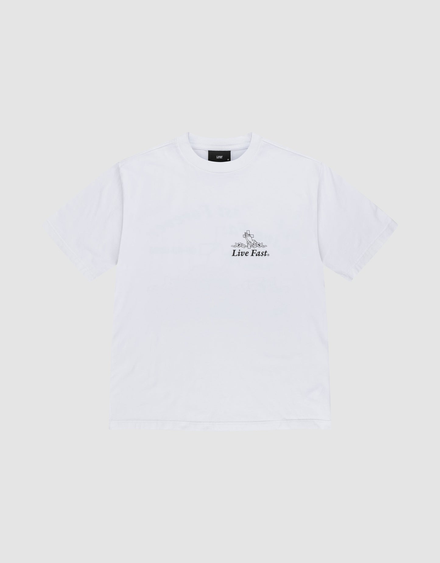 The LFDY Praying Tee by LIVE FAST DIE YOUNG is an Oversize Fit white short-sleeve t-shirt made from soft cotton, featuring "Live Fast." in small black text on the left chest, laid flat on a light gray background.