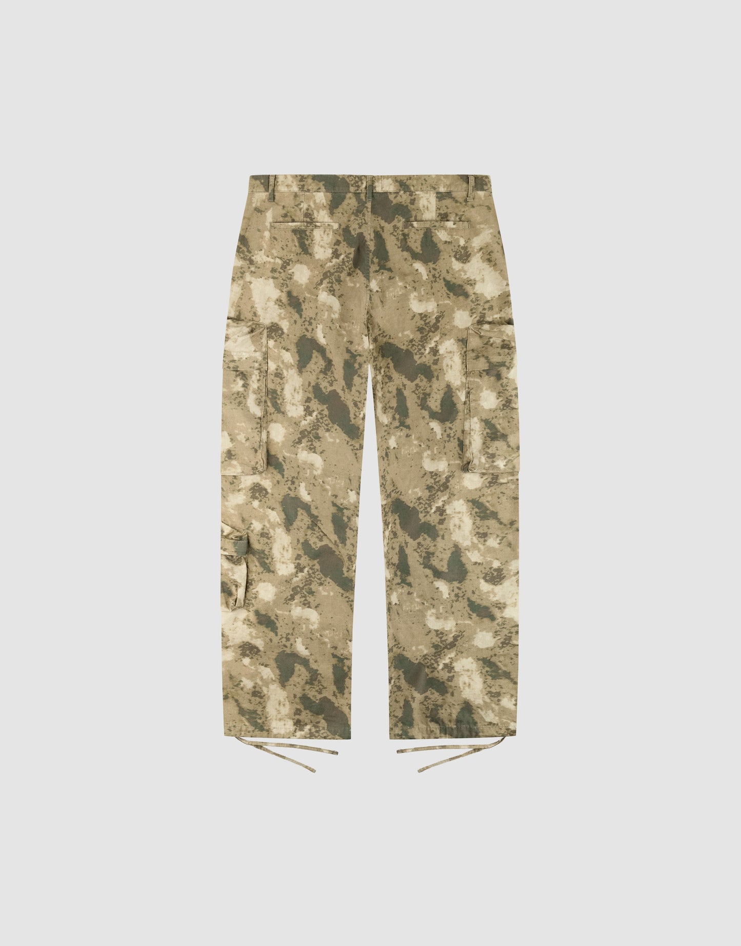 The LFDY Cargo pants by LIVE FAST DIE YOUNG, in beige and green camouflage cotton, feature a wide fit, multiple pockets, and hem drawstrings, shown laid flat on a plain white background.