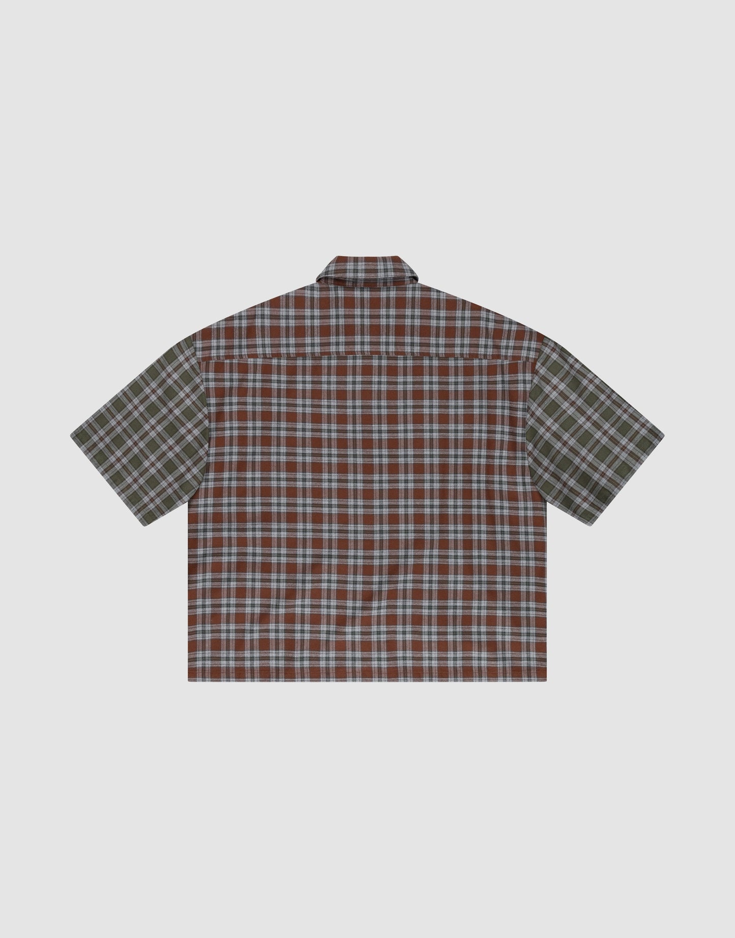 The LFDY Light Flannel by LIVE FAST DIE YOUNG is a short-sleeved, oversized button-up with mixed red/blue and green plaid panels, vintage washed look, and made from 100% cotton. Shown laid flat on a light background.