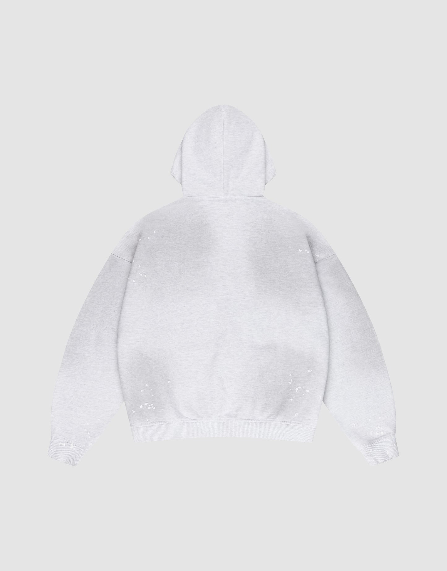 The LIVE FAST DIE YOUNG Live Fast Rivet Hooded Zip in light gray is laid flat, back up, on a matching background. It features an oversize fit and hand-applied spray effect with scattered white specks.
