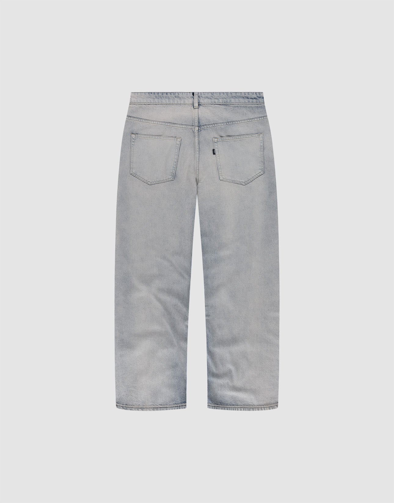 Back view of LFDY Baggy Denim by LIVE FAST DIE YOUNG in light gray, featuring two rear pockets, a Flag Label, and a straight leg cut, shown against a plain white background.