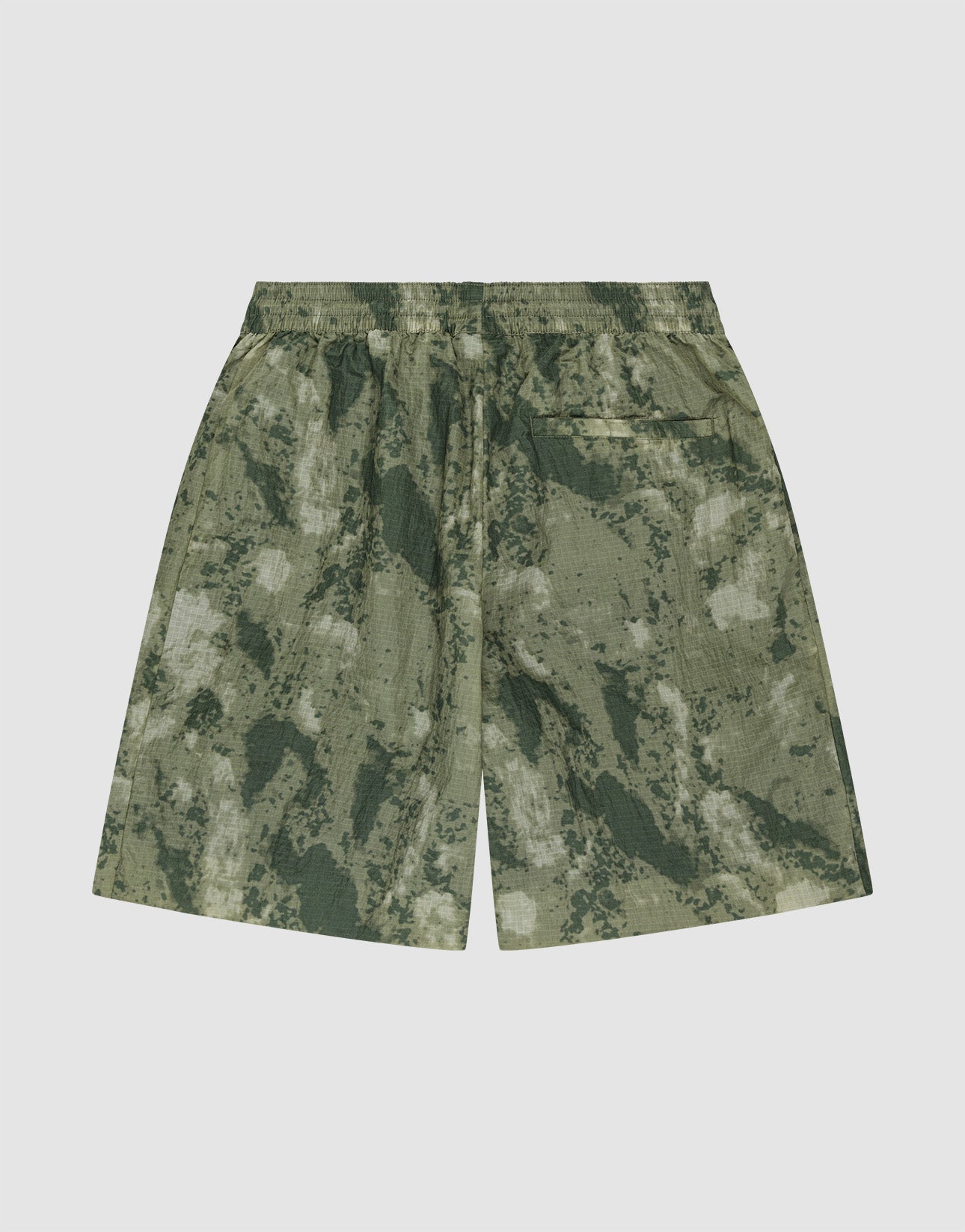 LIVE FAST DIE YOUNG Live Fast Nylon Shorts in green camouflage, featuring an elastic waistband for comfort and a single back pocket, shown flat on a plain light background.