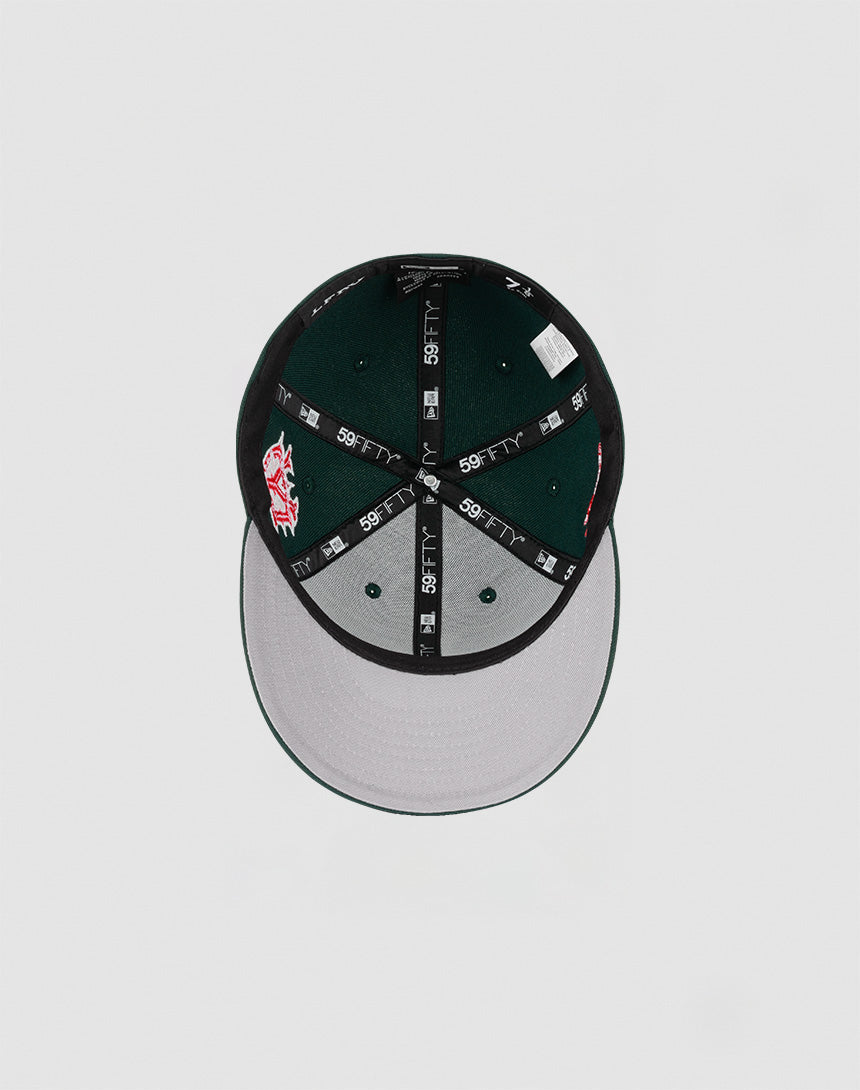 A top-down view of the LFDY x NEW ERA 59FIFTY Low Profile cap by LIVE FAST DIE YOUNG shows a black fitted design with a gray underbrim, green interior, black sweatband, and 59FIFTY branding on the inner taping.