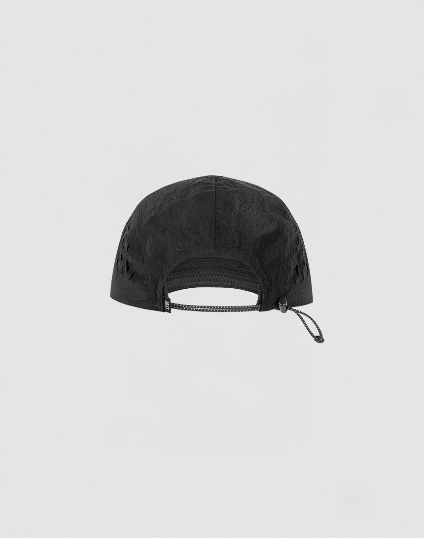 The LIVE FAST DIE YOUNG Live Fast 5 Panel Cap is shown from the back in black, made of textured nylon with an adjustable elastic cord and toggle. The cap is set against a plain light gray background.