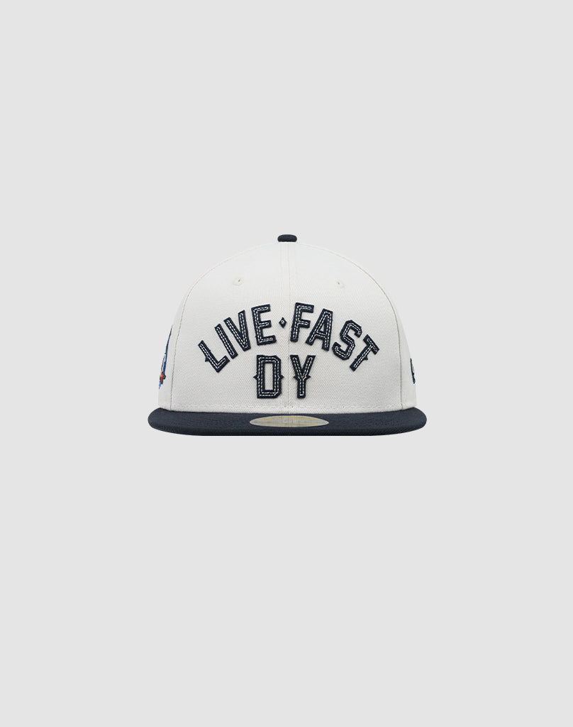 The LFDY X NEW ERA 59FIFTY by LIVE FAST DIE YOUNG is a white fitted cap with a dark brim, featuring bold LIVE FAST DY embroidery on the front. Größentabelle available for perfect sizing.| plain 