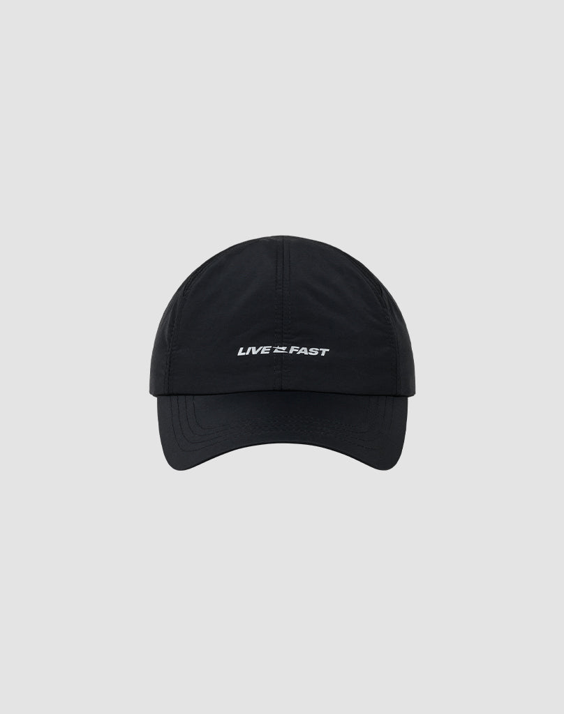 The Live Fast Performance Cap by LIVE FAST DIE YOUNG is a black, größenverstellbar nylon cap with “LIVE 2 FAST” embroidered in white, featuring reflective print and shown on a plain light gray background.| plain 