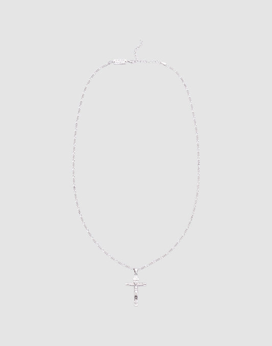 The LIVE FAST DIE YOUNG Cross Pendant is a delicate silver necklace featuring a small cross crafted from 925 Sterling Silver, shown against a plain light gray background.