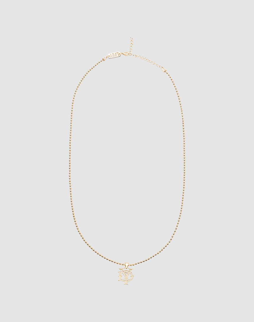 The DY Chain by LIVE FAST DIE YOUNG is a delicate vergoldet gold necklace with a sparkling NY Zirkonia pendant, shown on a plain light gray background. 