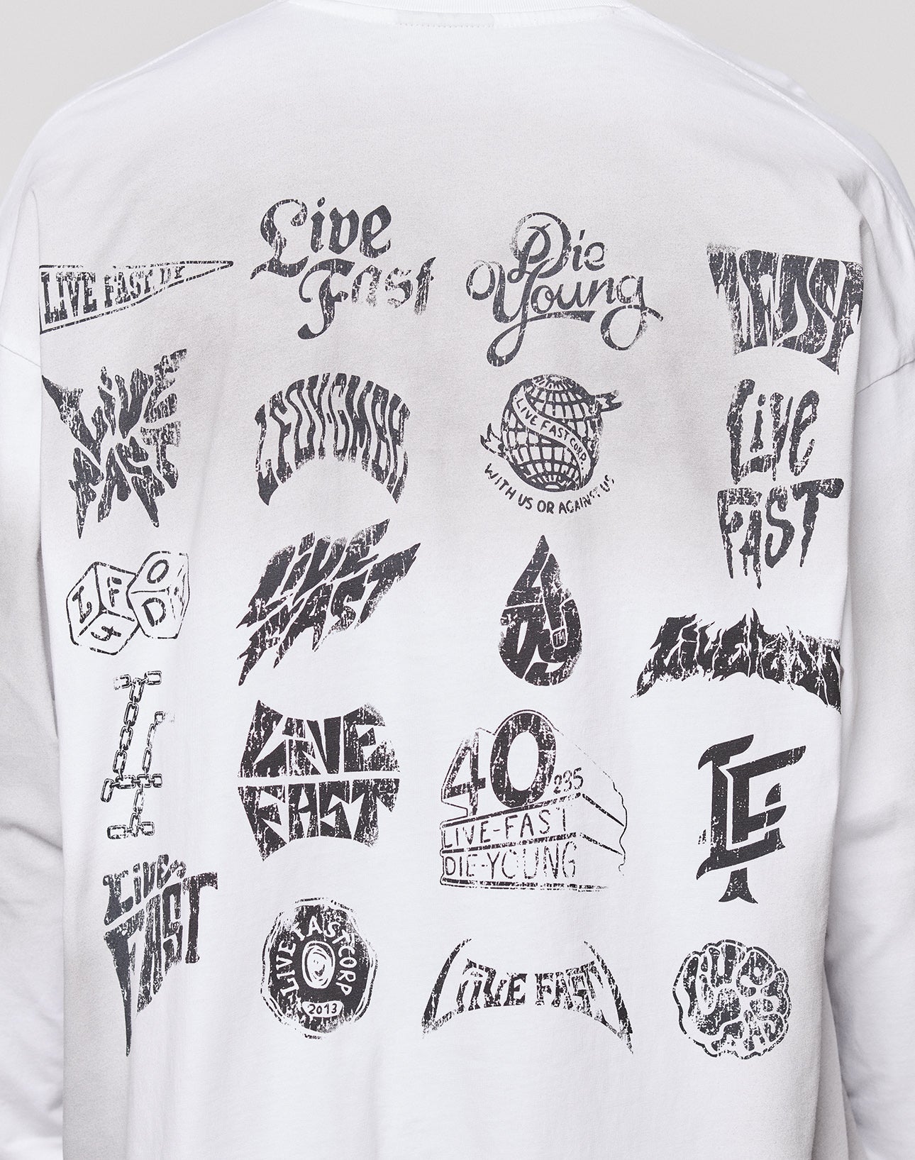 The LFDY Logo Longsleeve by LIVE FAST DIE YOUNG is a white, 100% Baumwolle shirt with black graphic logos and "Live Fast Die Young" text in a grid on the back. Designed with an oversize fit for a relaxed, comfortable look.