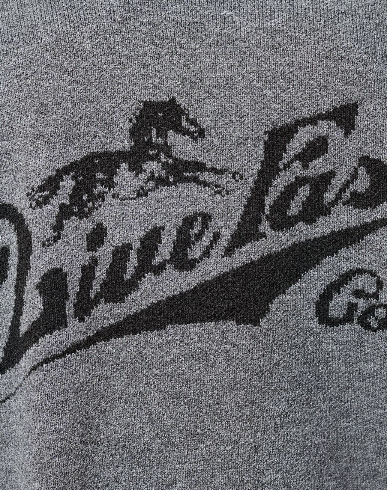 Close-up of the Boxy Knit Zip Jacket by LIVE FAST DIE YOUNG, in gray with black raglan sleeves and collar, featuring "Live Fast" embroidered in black cursive on the chest.