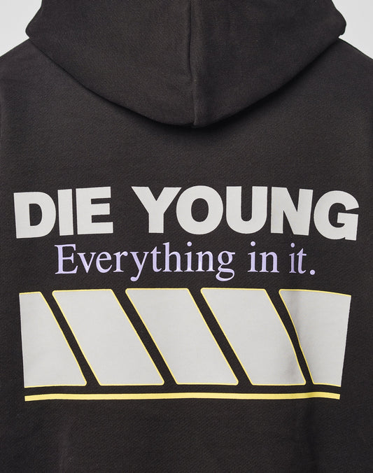The LFDY Racing Hooded by LIVE FAST DIE YOUNG is a black oversized hoodie with bold white DIE YOUNG text above smaller purple Everything in it, four yellow-outlined white diagonal bars, and a glossy Baumwolle Polyester finish.