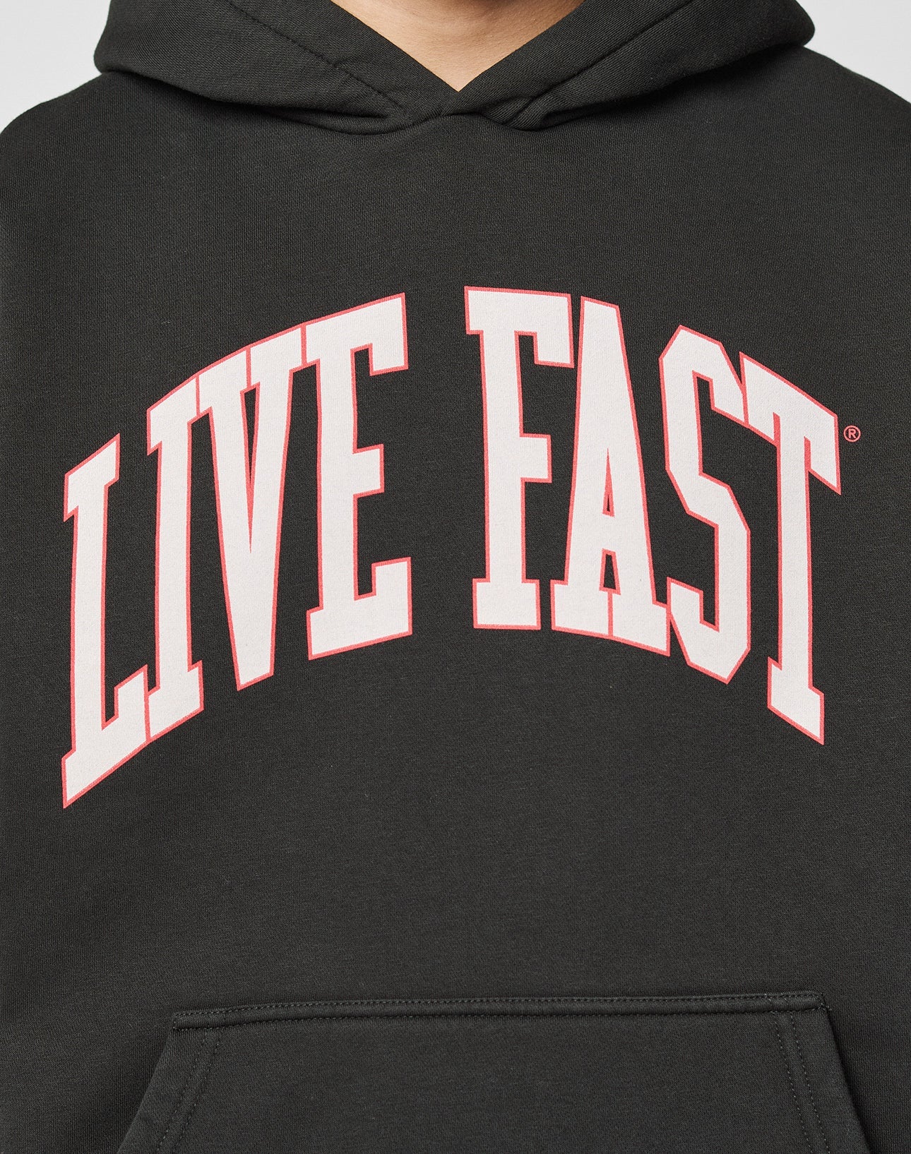 The Live Fast College Hooded by LIVE FAST DIE YOUNG is a black, oversized hoodie featuring a bold LIVE FAST front print in large white and red letters, made from 65% Baumwolle for comfort and style.
