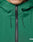 Close-up of the LIVE FAST DIE YOUNG Basic Shell Jacket in green with an oversized fit, front zipper, and black drawstrings. The lower right corner features a white LIV reflective print. The bottom part of a person’s face is seen above the collar.