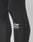 Close-up of a person wearing LIVE FAST DIE YOUNG Live Fast Performance Tights in black, featuring a white logo, DIVE FAST™ printed on the side, and a comfortable Elastikbund for added support.