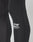 Close-up of a person wearing LIVE FAST DIE YOUNG Live Fast Performance Tights in black, featuring a white logo, DIVE FAST™ printed on the side, and a comfortable Elastikbund for added support.