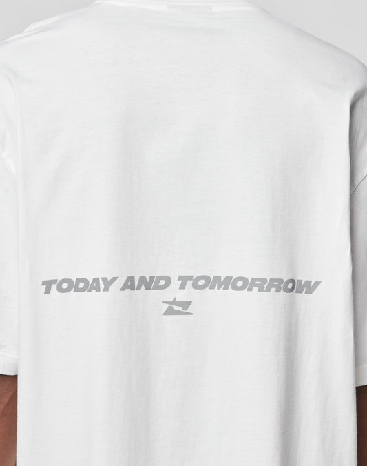 A close-up of the back of the white LFDY Trinity Tee by LIVE FAST DIE YOUNG in an Oversize Fit, made from 100% Baumwolle, features TODAY AND TOMORROW in light gray and a small geometric logo below.