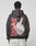 A person faces away from the camera wearing the LFDY Middlefinger Hooded by LIVE FAST DIE YOUNG—an oversize Baumwolle-Polyester hoodie with a bold red “LIVE FAST” and a middle finger hand graphic on the back.