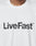 A person wears the Basic LiveFast Tee by LIVE FAST DIE YOUNG—white, regular fit, cotton t-shirt with “LiveFast™” printed in bold black letters across the chest.