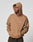 A person in an oversize fit brown Live Fast Plain Hooded sweatshirt by LIVE FAST DIE YOUNG, made from Baumwolle and Polyester with LIVE FAST. on the chest, stands hands-in-pocket looking to the side against a plain light background.