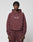 A person wears a matching maroon LFDY Embroidery Hooded and sweatpants set by LIVE FAST DIE YOUNG, crafted from soft French Terry and 100% Baumwolle. "Live Fast" is embroidered in white as they face forward against a light gray background.