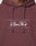 Close-up of a person wearing the LFDY Embroidery Hooded by LIVE FAST DIE YOUNG. This maroon regular fit hoodie features white embroidered text, drawstrings, and is crafted from 100% Baumwolle for comfort.