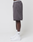 A person stands sideways wearing gray Live Fast LF Shorts by LIVE FAST DIE YOUNG, featuring an elastic waistband and side pockets, paired with white socks and sneakers. Only the lower half is visible against a plain white background.