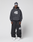 A man faces forward wearing the LIVE FAST DIE YOUNG LFDY 40 Hooded in dark gray with white graphics and a Kangaroo-Tasche, paired with matching baggy sweatpants, a patterned headscarf, and white sneakers against a plain light gray background.