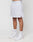 A person in white LIVE FAST DIE YOUNG LFDY Piping Mesh Shorts with a regular fit, elastic waistband, drawstring, and small logo near the hem, paired with white LFDTY socks and sneakers, stands against a plain light background.