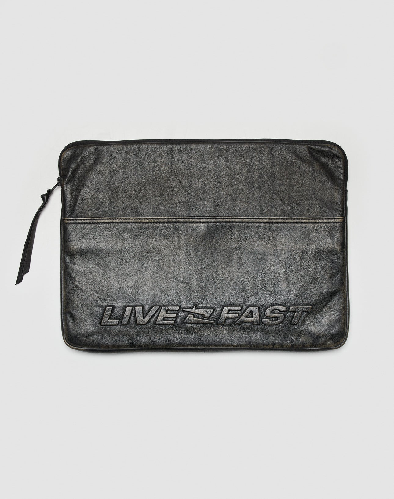 The LFDY Laptop Leather Case by LIVE FAST DIE YOUNG is a black Rindsleder sleeve featuring a front zipper pocket, embossed LIVE FAST logo across the bottom, and an inner pocket for organization.