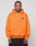 A man stands facing forward against a plain light background, wearing the LIVE FAST DIE YOUNG Basic Orange Hooded sweatshirt made from Baumwolle and Polyester, featuring a small printed chest logo. His hands are by his sides with a neutral expression.