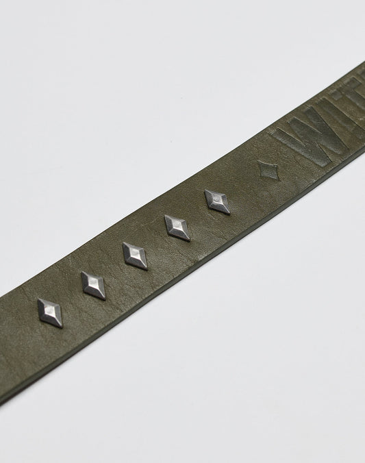 A close-up of the LIVE FAST DIE YOUNG LFDY Signature Belt in greenish-brown, featuring embossed text and five evenly spaced diamond-shaped silver studs, set against a plain white background.