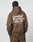A person with braided hair is wearing an oversize fit brown LIVE FAST DIE YOUNG Basic 360 Hooded and matching pants. The back showcases bold white text, a small paragraph, and icons underneath.