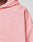 Close-up of a person wearing the Basic Hooded Zip by LIVE FAST DIE YOUNG in light pink, featuring a small white LFDY™ chest logo. The cropped fit shows part of the face, neck, shoulder, and upper chest for a sleek branded look.