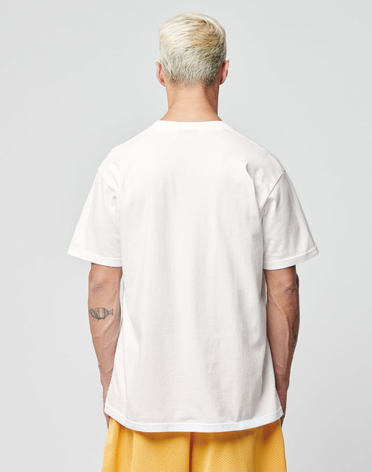 A person with short, bleached blond hair is seen from behind, wearing a LIVE FAST DIE YOUNG LFDY Fries Tee in plain white and yellow shorts against a light gray background. (LF2406-15695).